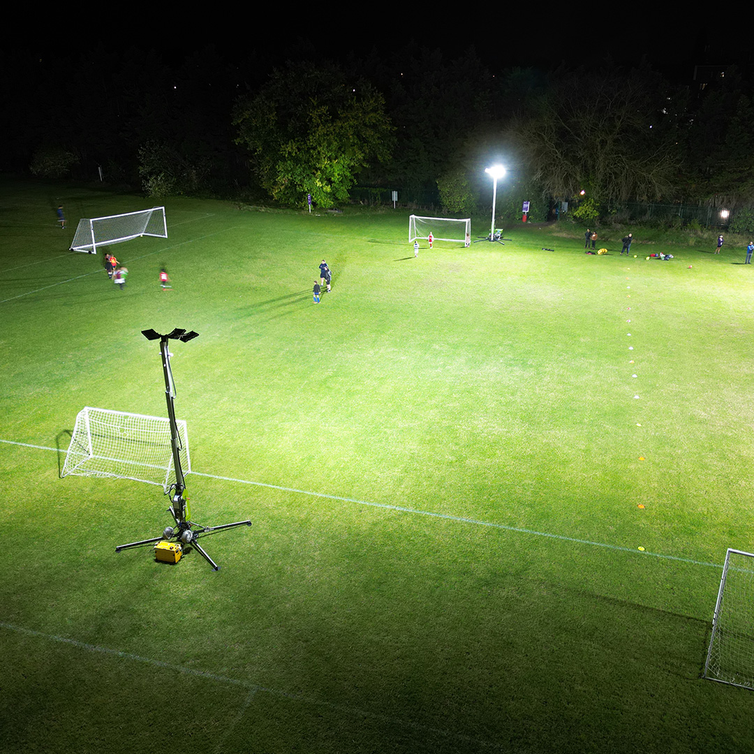 Ritelite Quad Pod K65 mobile lighting towers lighting up a soccer field