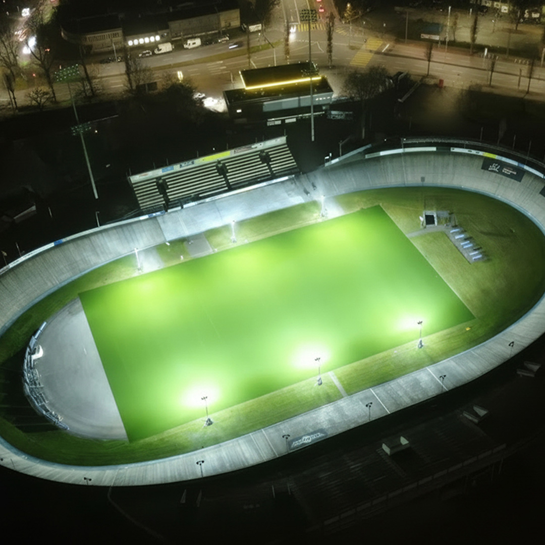 Ritelte Quad Pod K65 mobile lighting towers lighting up a sports pitch within a velodrome for winter training