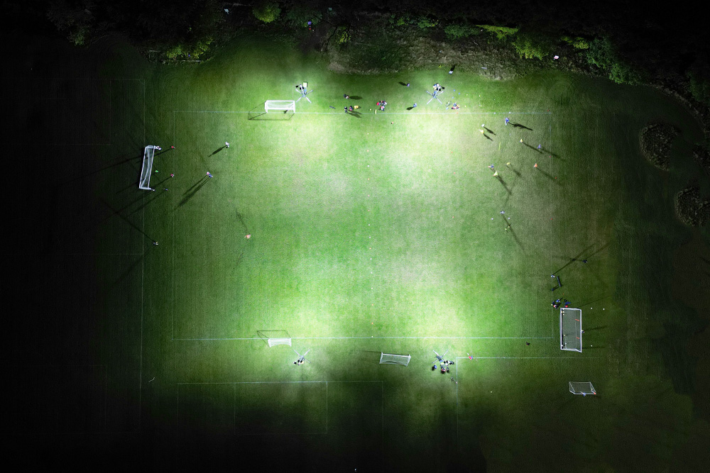 Ritelite Sports-LITE training kit lights up single tennis court in the dark for winter training