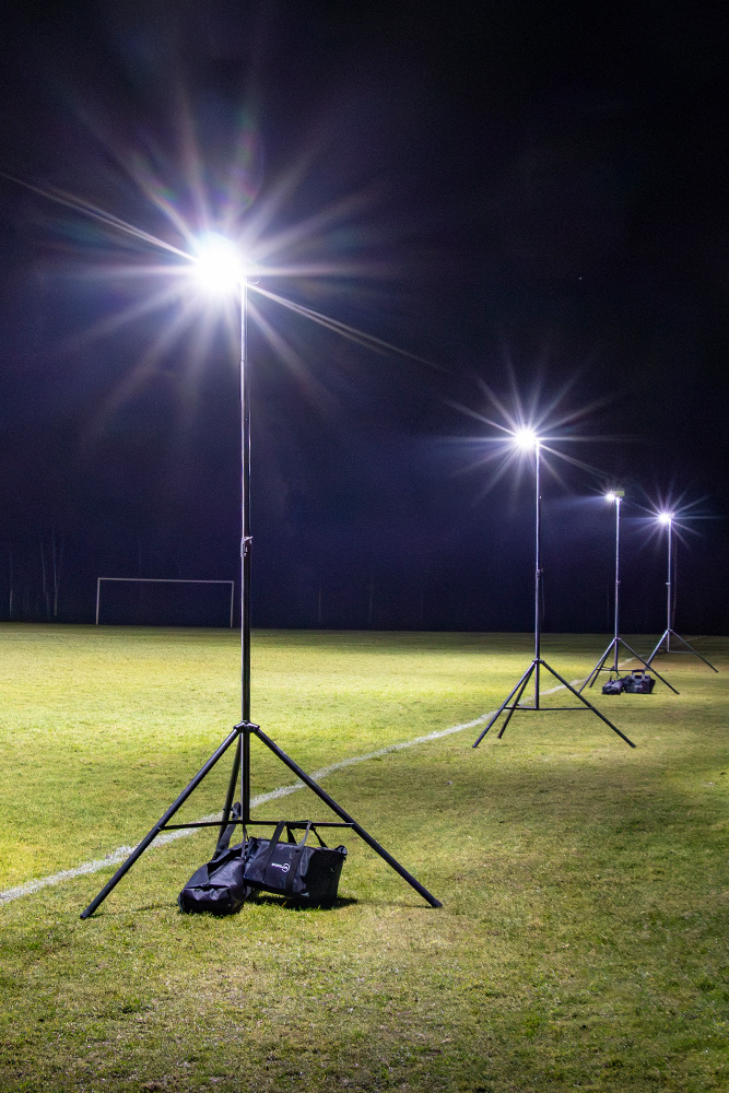 Ritelite Sports-LITE battery powered portable sports lights lighting up multiple netball courts for winter training